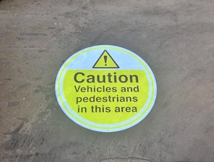 Industrial projected warning sign