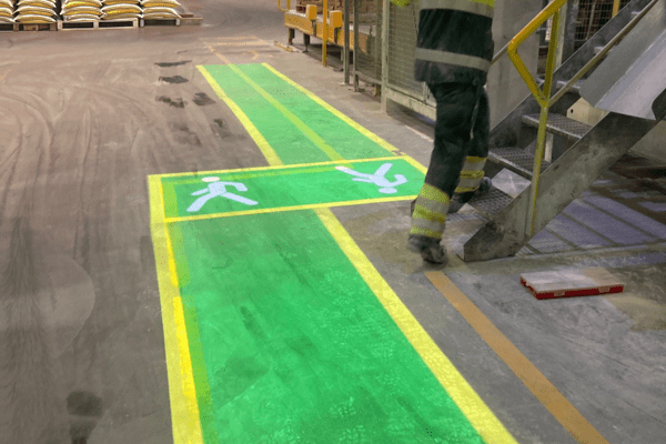 Projected pedestrian walkways in industrial workplaces